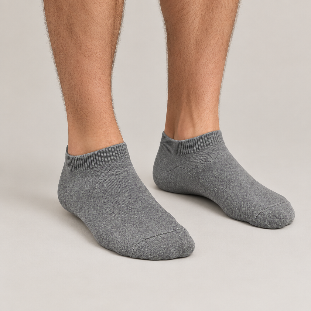 Male model wearing gray ankle socks